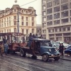 Burning city street scene with onlookers in flames