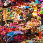 Vibrant fruits and vegetables at bustling market scene