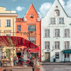 Vibrant buildings on charming street with ornate facades and flowering trees