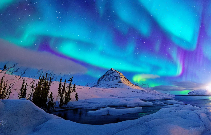 Majestic aurora borealis over snowy mountain landscape