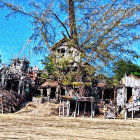 Intricate architecture of fantastical treehouse in forested area