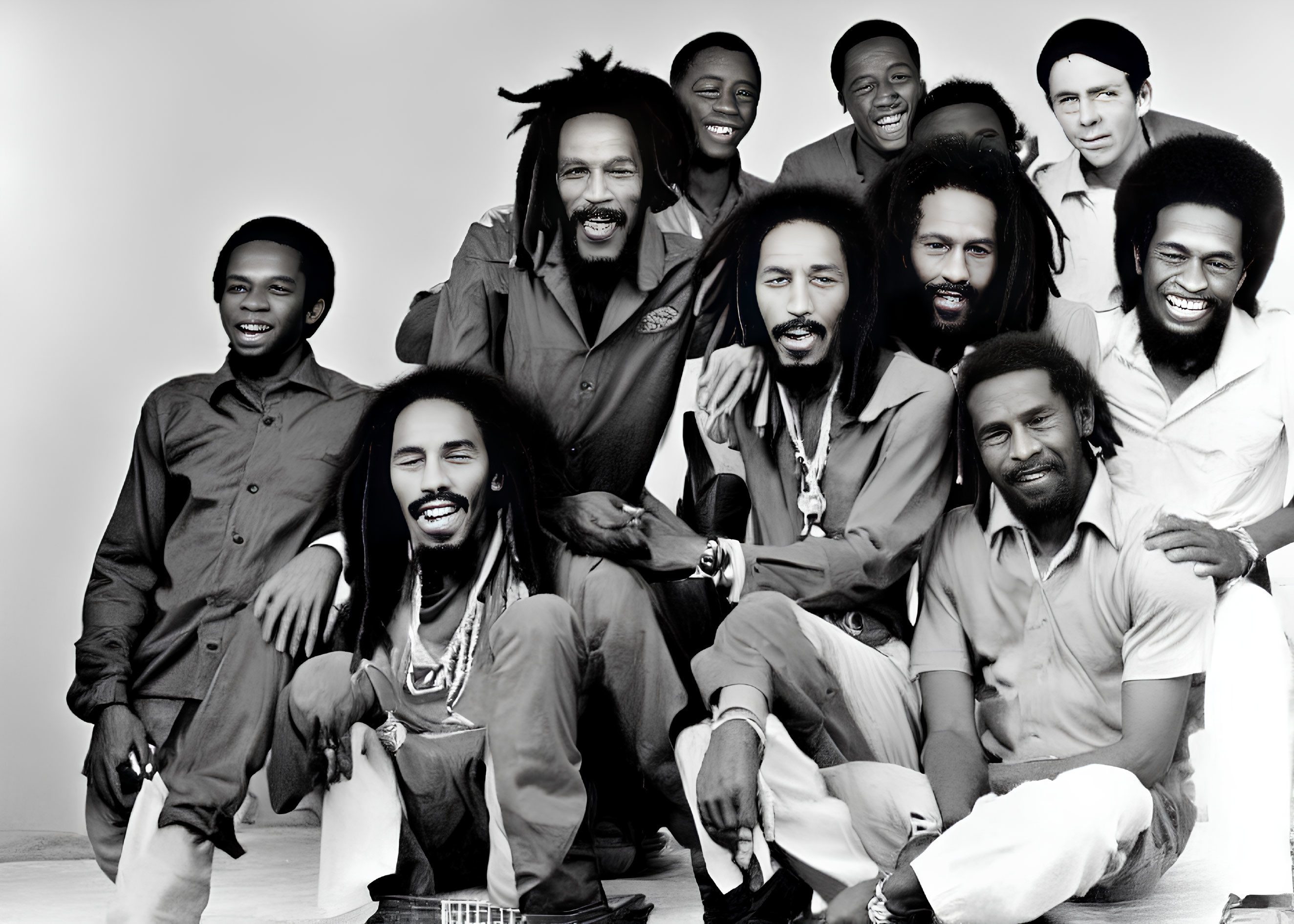 Men with dreadlocks in joyful black and white group photo