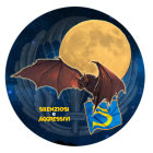 Stylized Bat Against Full Yellow Moon in Circular Frame