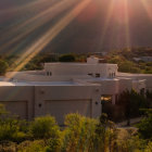 Vibrant Desert Home with Mountains and Sunset Colors