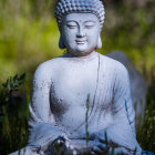 Serene Buddha Statue in Meditative Pose with Gray Tones