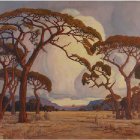 Savanna landscape with umbrella acacia trees and distant mountain range