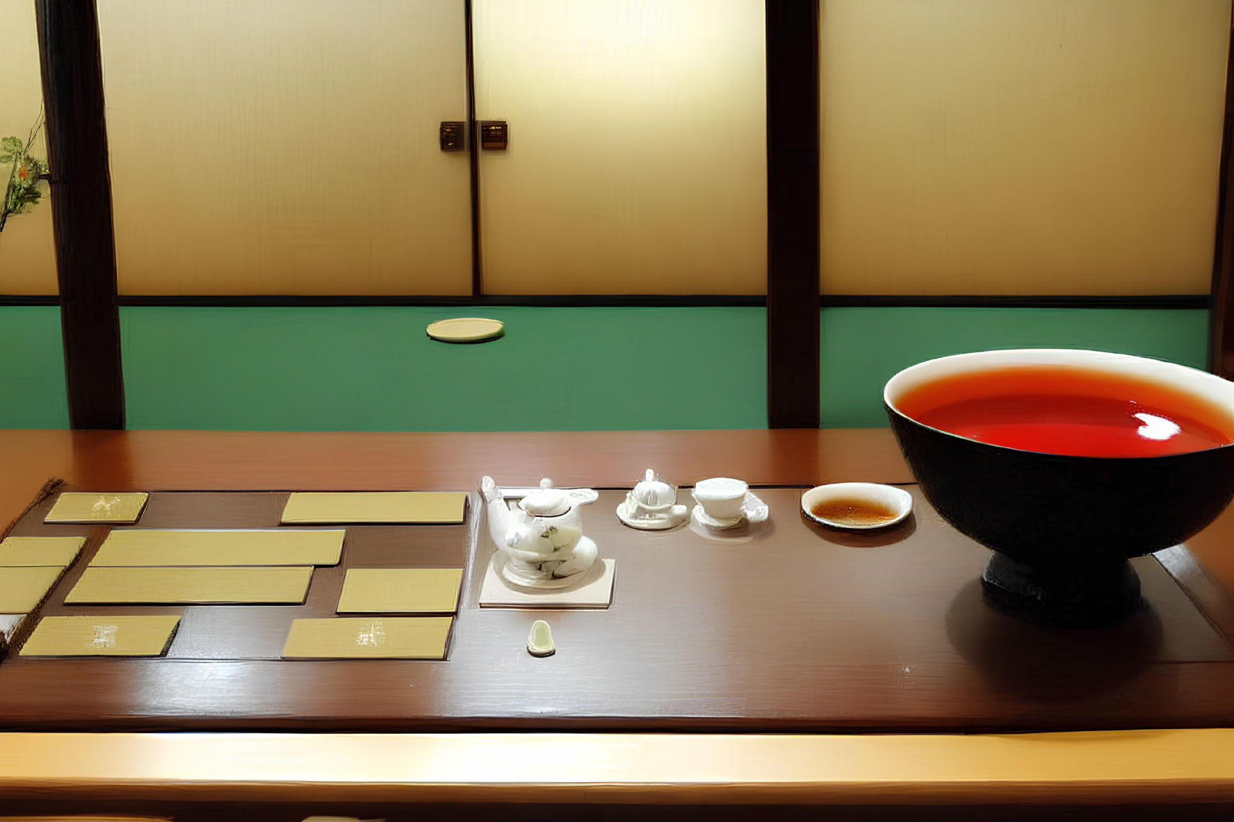 Traditional Japanese tea ceremony setup with red liquid, utensils, and tatami mats