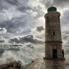 Whimsical painting of stone tower in dreamy landscape