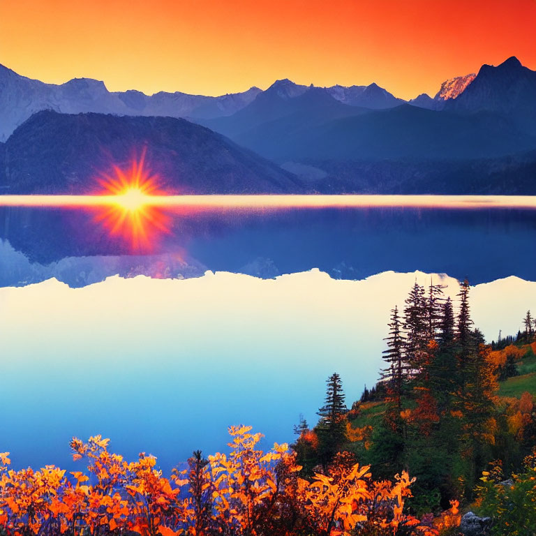 Scenic sunset over tranquil lake with mountain reflections