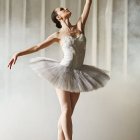 Elegant ballerina on pointe in tutu and ballet shoes