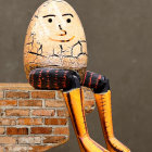 Surreal artwork featuring person with egg-shaped head and golden boots on brick wall