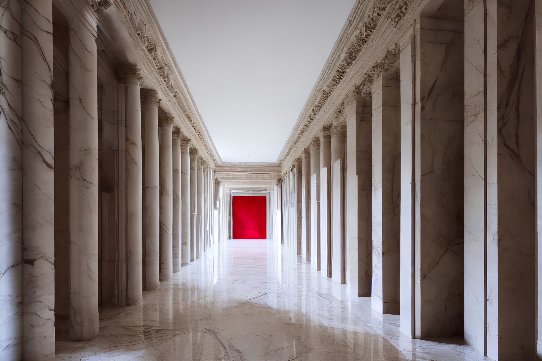 Marble corridor with tall columns and red doorway under coffered ceiling