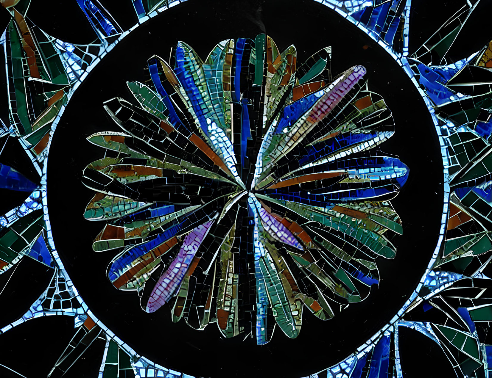 Colorful Circular Mosaic Artwork on Dark Background