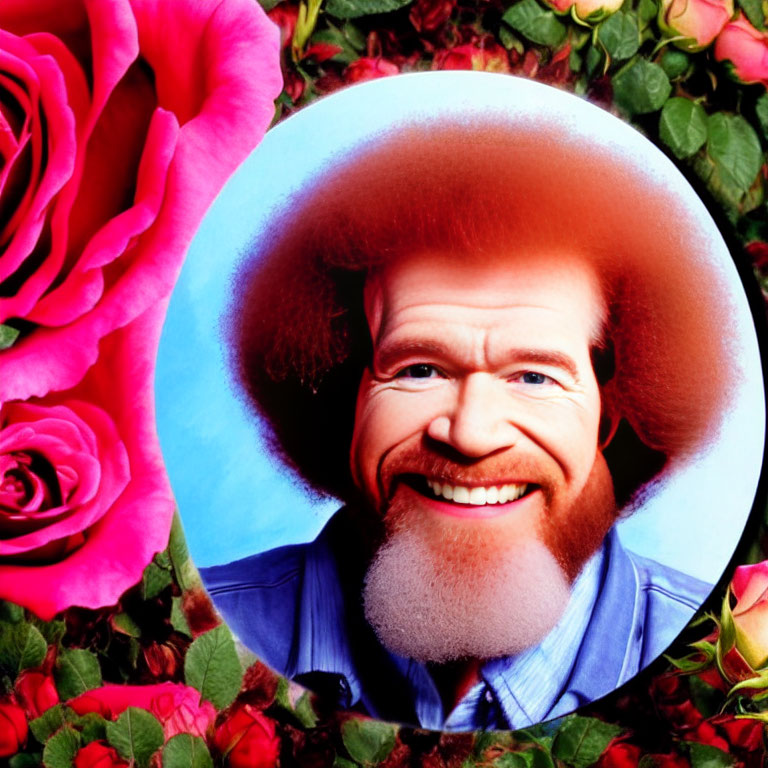 Smiling man with ginger afro and denim shirt in circular backdrop with red roses