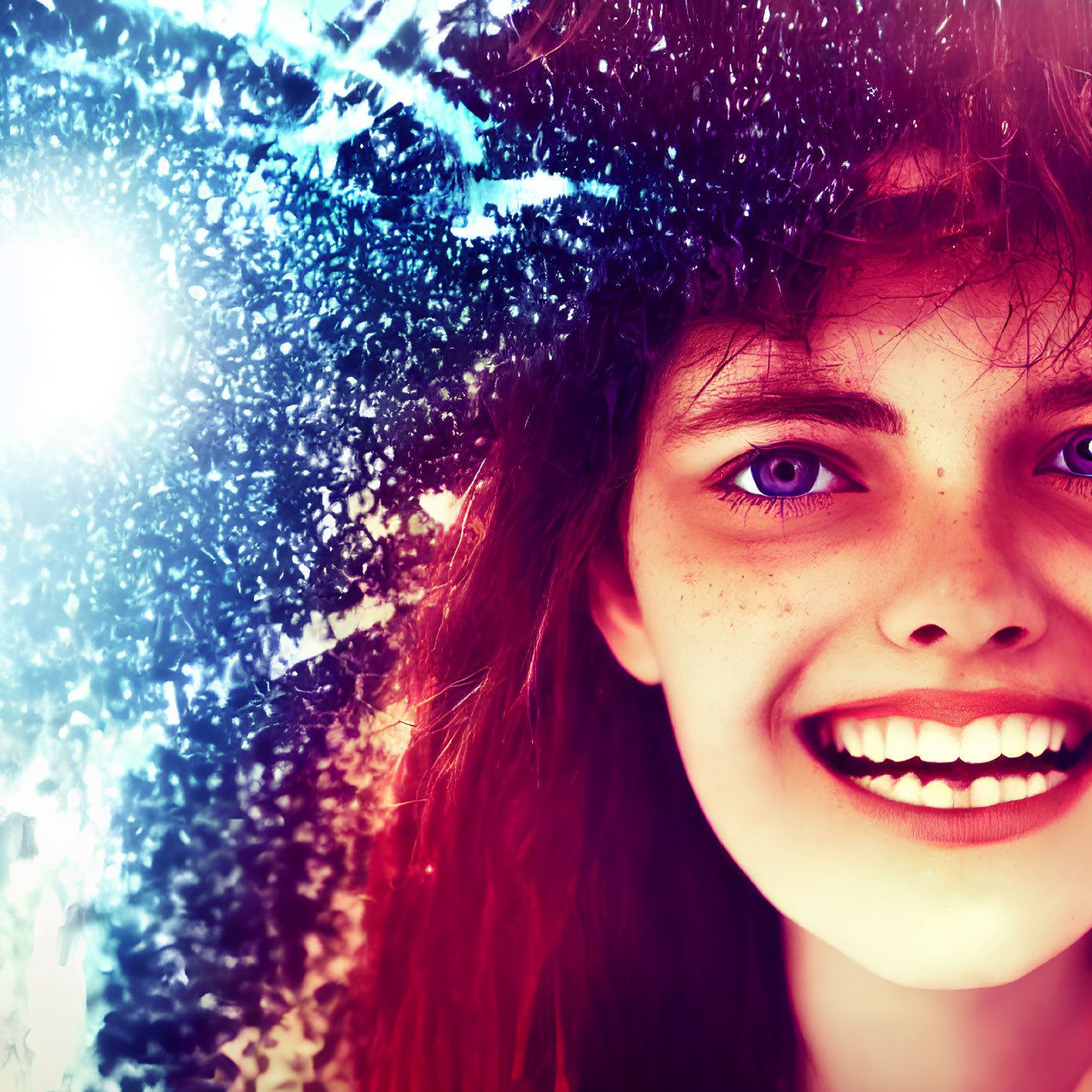 Smiling young woman with colorful glitter effect on face