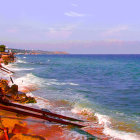 Colorful seascape with sailing ships, vibrant town, and clear sky