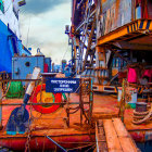 Colorful Ship Graveyard Scene Under Clear Blue Sky