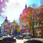 Vibrant street scene with vintage cars, elegant buildings, and autumn trees under sunny sky