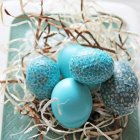 Ornate Turquoise Easter Eggs in Golden Bowl Display