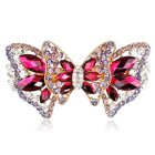 Symmetrical Butterfly-Inspired Women's Faces in Jewel Tones