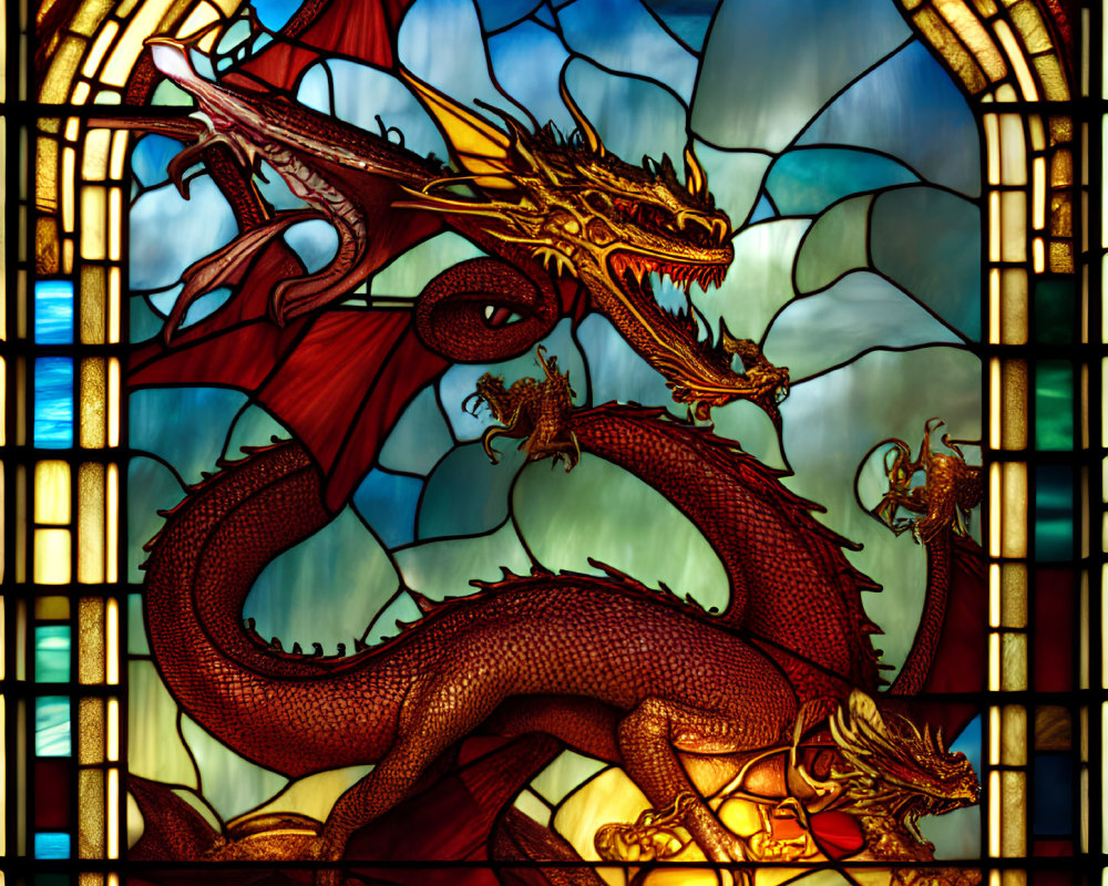 Multi-headed dragon stained glass window in red and gold hues on deep blue sky backdrop