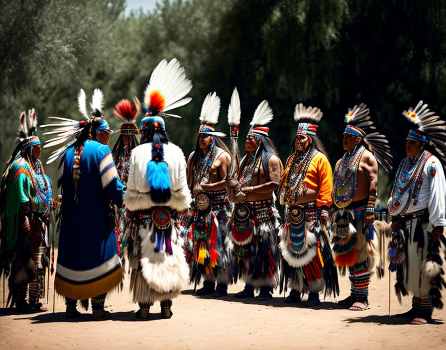 Indigenous People in Traditional Feathered Headdresses Dance Outdoors