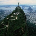 Iconic Christ the Redeemer statue on Corcovado Mountain, Rio de Janeiro cityscape.