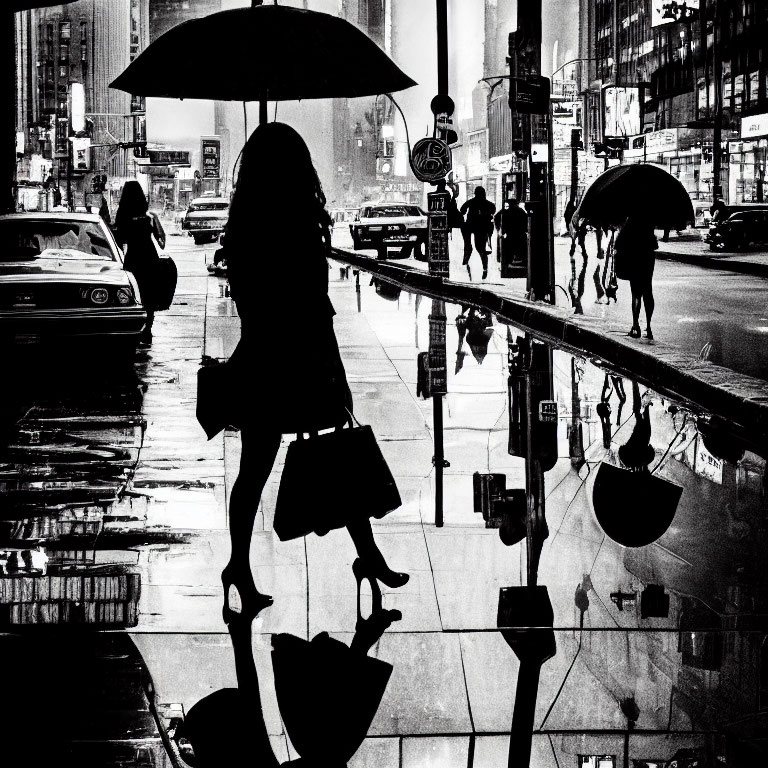 Silhouetted Figures with Umbrellas on Wet City Street