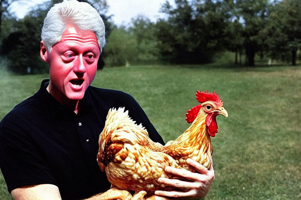 Man with White Hair Holding Chicken on Grass Background