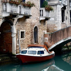 Tranquil Venetian Canal with Colorful Buildings and Boats