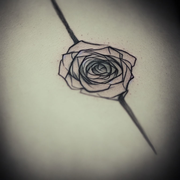 Geometric-style rose tattoo with intricate line work