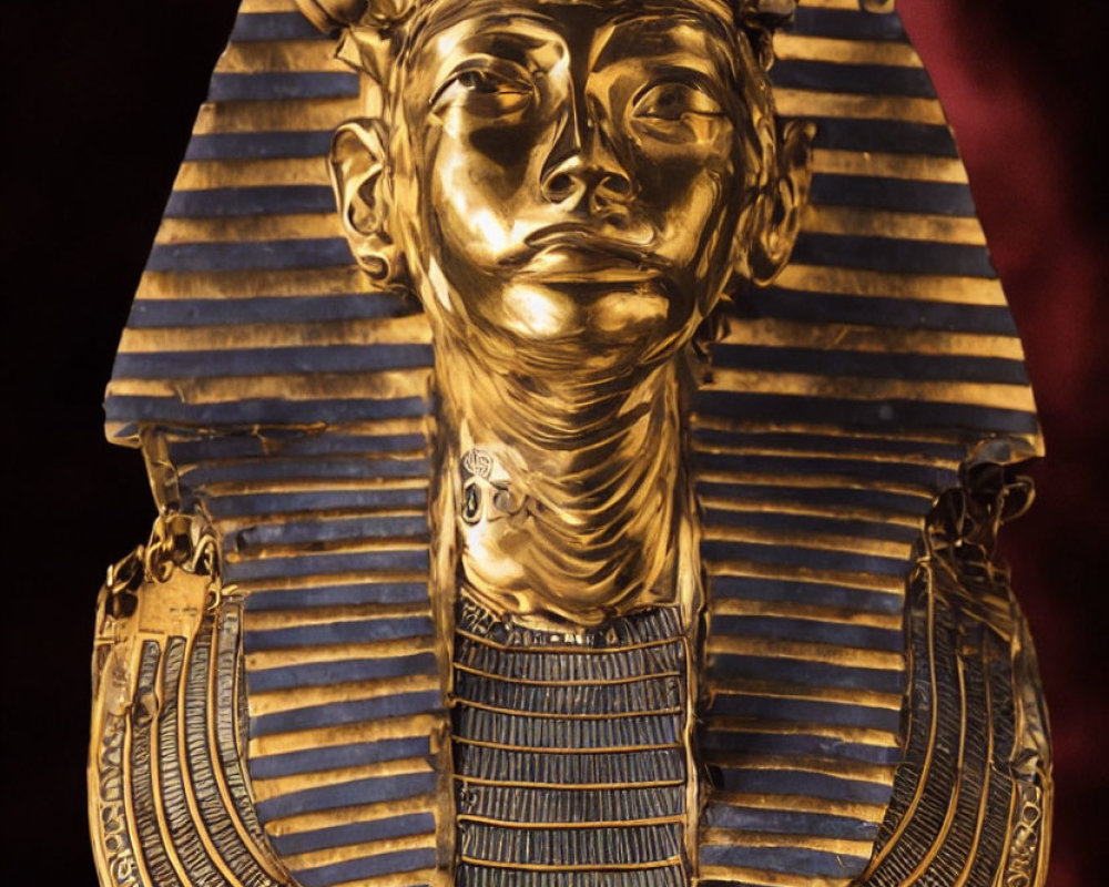 Golden Mask with Lapis Lazuli Patterns on Headdress on Dark Background