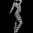 Dramatic Pose in Striped Body Suit and Horned Headdress