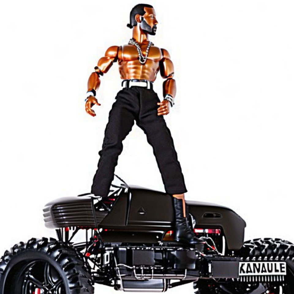 Muscular action figure on black RC monster truck with sunglasses and chains