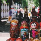 Colorful Matryoshka dolls with Russian patterns on stylized backdrop