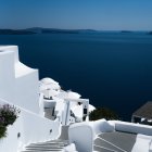 Greek Island Scene: White Houses, Cobblestone Path, Blue Sea, Boats, Seag