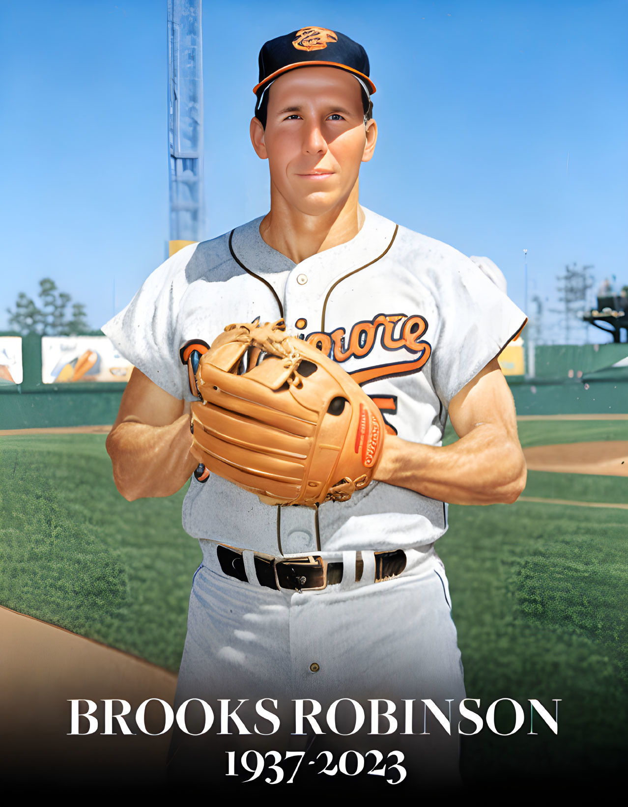 Baseball player in Orioles uniform with Brooks Robinson tribute 1937-2023