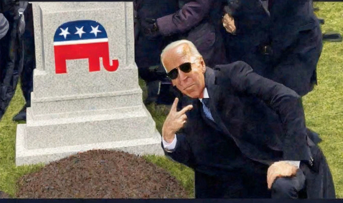 Person making peace sign near tombstone with political emblem.