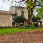 Tranquil country house with lush gardens and vibrant flowers