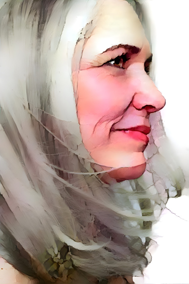 Grey haired woman with a soft smile