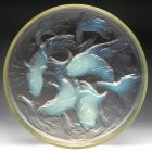 Translucent ethereal octopus in glass sphere on gradient background