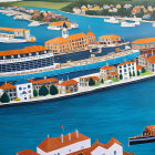 Vibrant coastal town with cruise ship, sailboats, and clear blue water