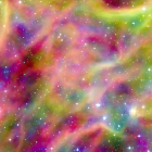 Multicolored space nebula with stars in pink, blue, green, and yellow