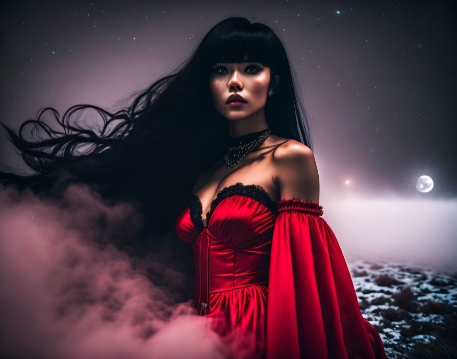 Woman in red dress under starlit sky with moon in misty landscape