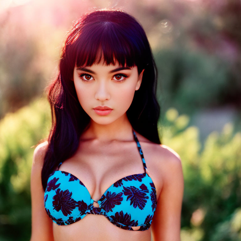 Dark-Haired Woman in Blue Floral Bikini Top Outdoors