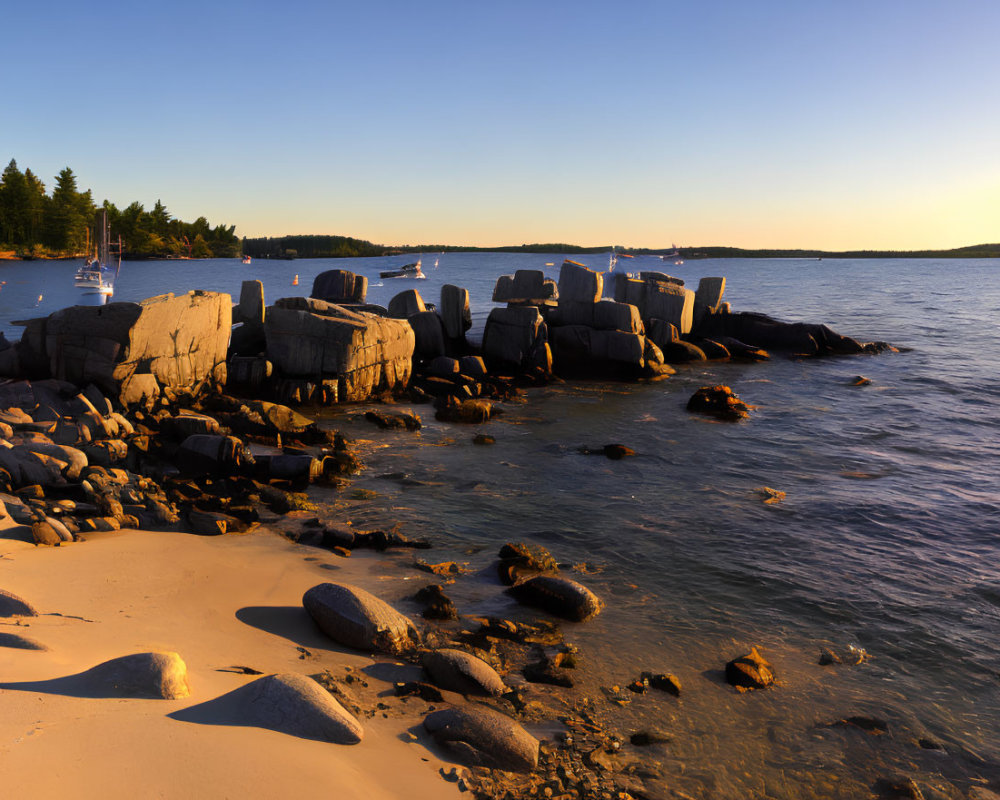 Tranquil Coastal Scene with Smooth Boulders and Anchored Boats