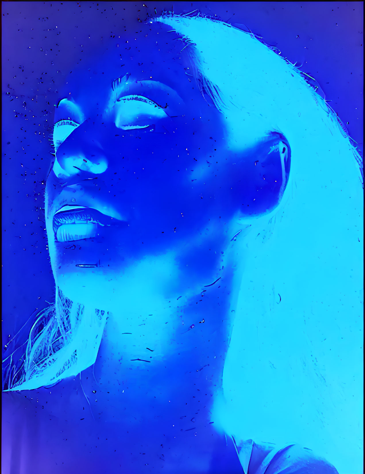 Side-profile portrait with vibrant blue and purple thermal filter effect.