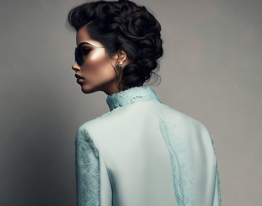 Profile of Woman in Elegant Updo and Sunglasses in Pale Blue Lace Dress