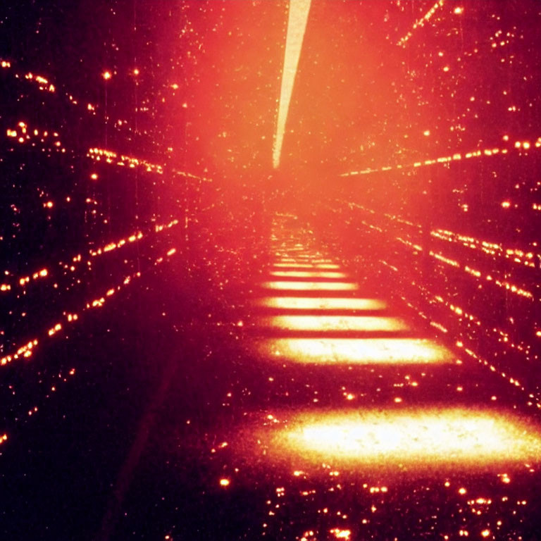 Symmetrical red-lit tunnel with bright light source