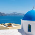 Geometric shapes and intricate patterns on coastline under blue sky